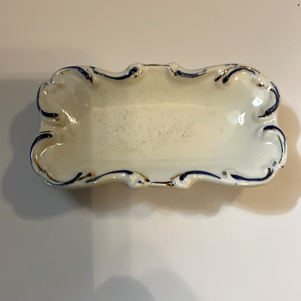 Nut dish by Royal Grace. Blue and Gold trim. 4.5” x 2.5” no chips or cracks